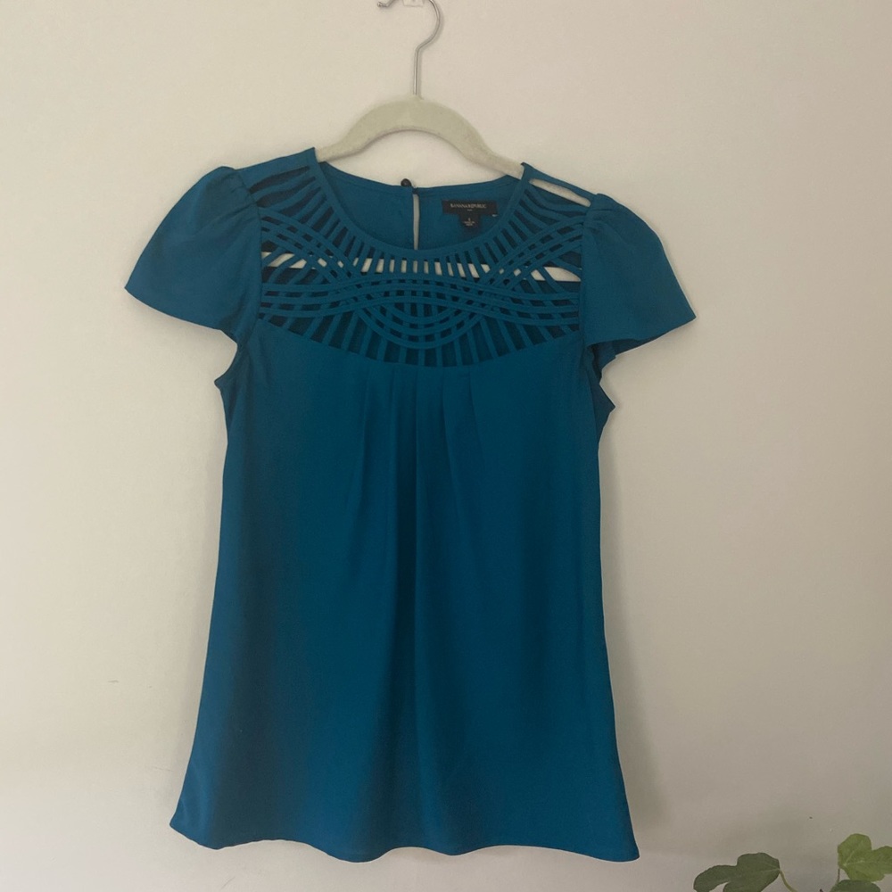 Blue dressy top with cutouts